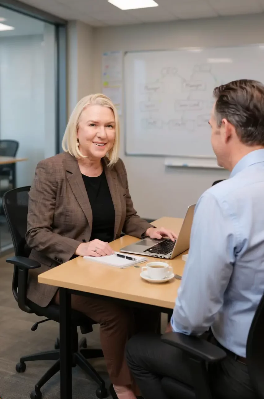 chatting with client over coffee